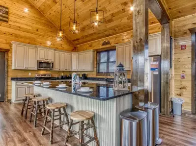 summit pool mansion kitchen with breakfast bar