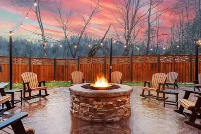 cabin with outdoor firepit